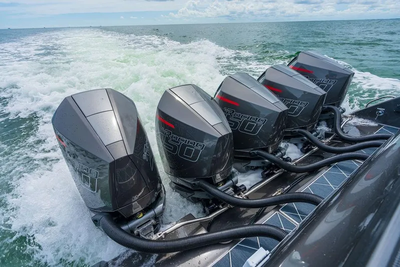 Incognito Yacht Photos Pics 2022 Cigarette 42 Nighteagle with five powerful outboard engines on open water.