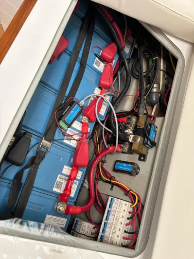 Making Memorie's Yacht Photos Pics Electrical system of a 1999 Manta 40, featuring batteries and wiring.