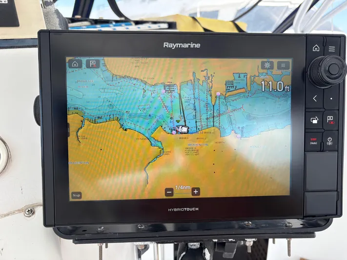Making Memorie's Yacht Photos Pics Raymarine navigation display on 1999 Manta 40, showing nautical chart and depth of 11.0 feet.