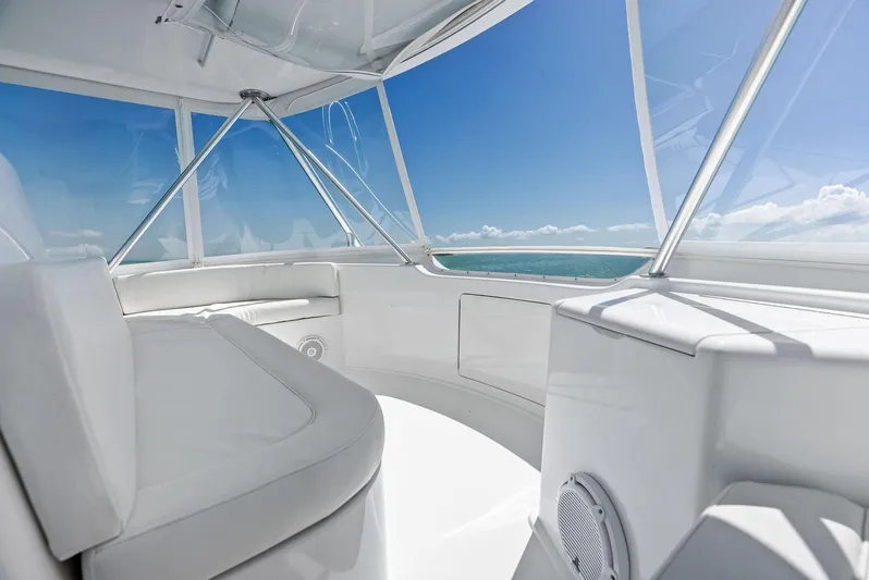 Ivelymar Yacht Photos Pics 2005 Viking 56 Convertible yacht interior with ocean view and white seating.