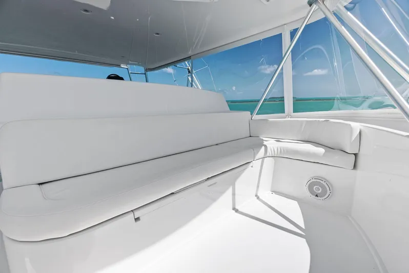 Ivelymar Yacht Photos Pics Luxurious seating on 2005 Viking 56 Convertible yacht with ocean view.