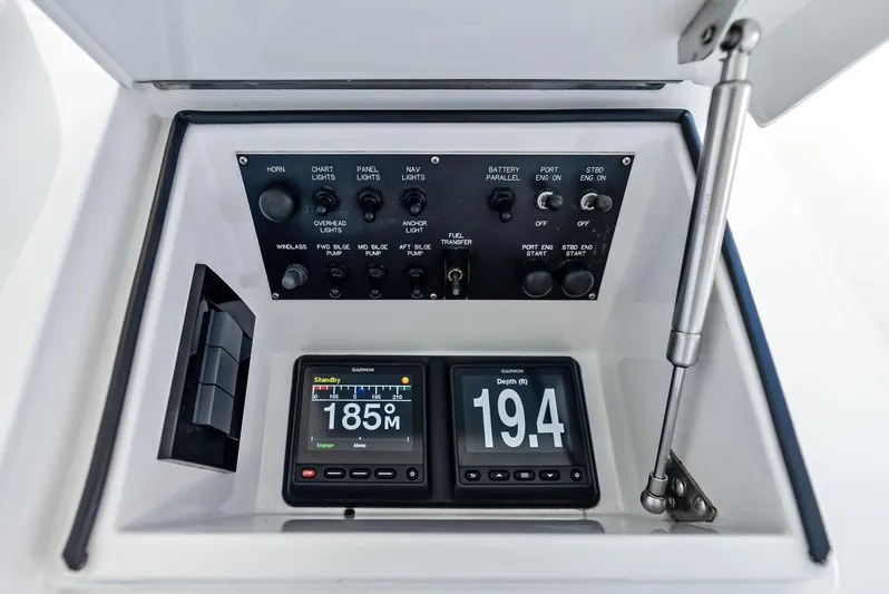 Ivelymar Yacht Photos Pics Control panel of a 2005 Viking 56 Convertible yacht with digital displays and switches.