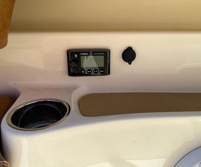 Shady Lady II Yacht Photos Pics Control panel and cup holder on 2019 Scout 380 LXF boat interior.