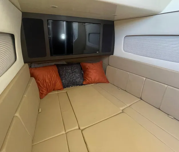 Shady Lady II Yacht Photos Pics Luxurious interior cabin of 2019 Scout 380 LXF with plush seating and TV.