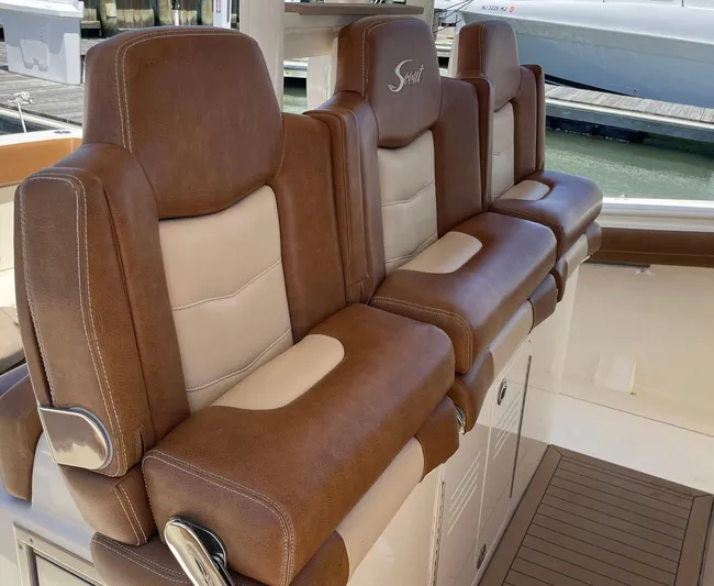 Shady Lady II Yacht Photos Pics Luxurious leather seating on 2019 Scout 380 LXF boat, featuring elegant design and comfort.