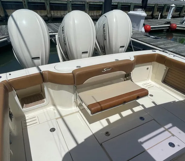 Shady Lady II Yacht Photos Pics 2019 Scout 380 LXF boat with triple outboard engines at dock.