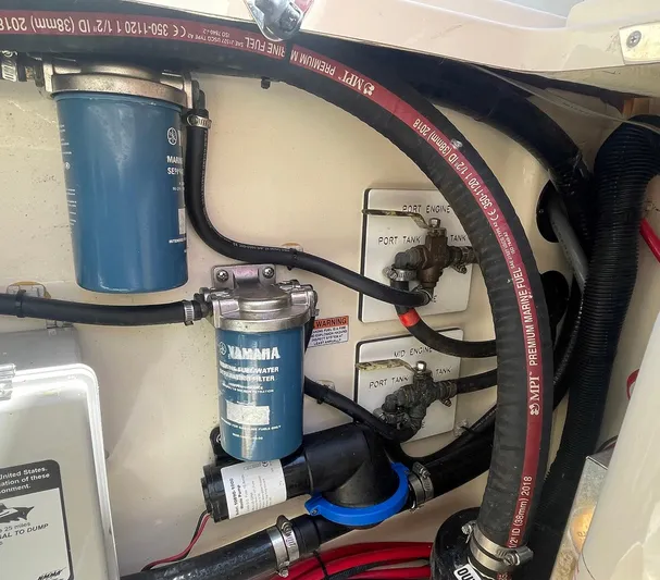 Shady Lady II Yacht Photos Pics Engine compartment of a 2019 Scout 380 LXF with Yamaha filters and fuel lines.