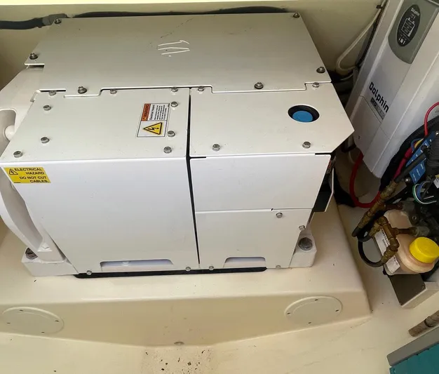 Shady Lady II Yacht Photos Pics Engine compartment of a 2019 Scout 380 LXF boat, featuring mechanical components.