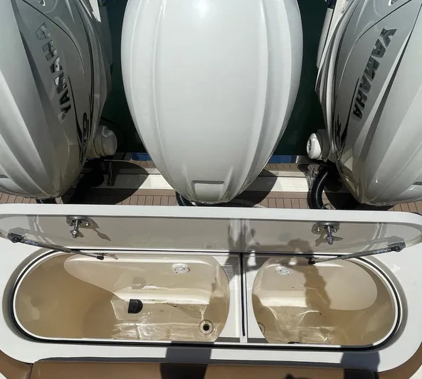 Shady Lady II Yacht Photos Pics 2019 Scout 380 LXF boat with Yamaha engines and open storage compartments.