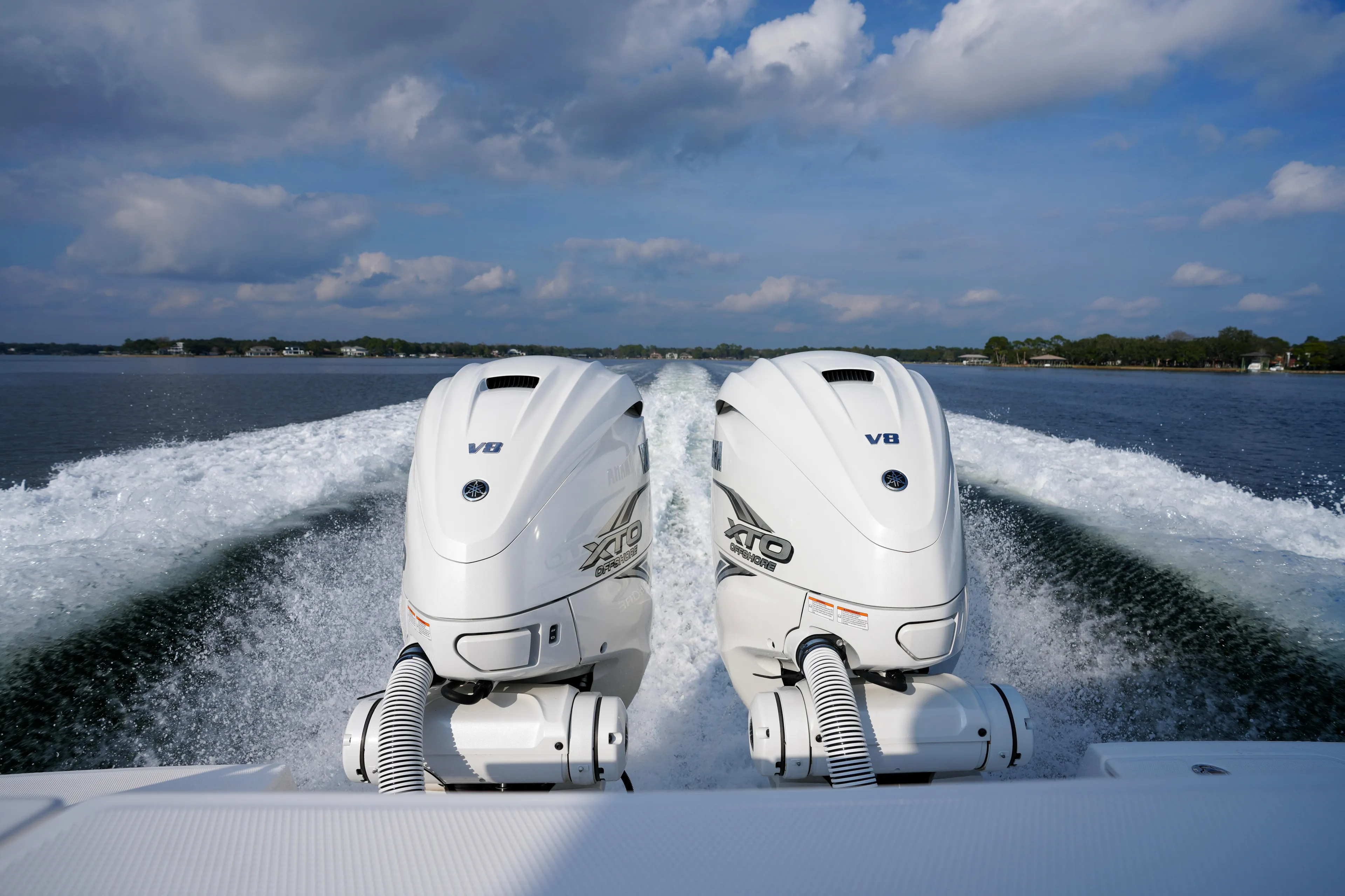 Yacht Photos Pics Twin V8 engines powering a 2023 Everglades 340 Dual Console boat on open water.
