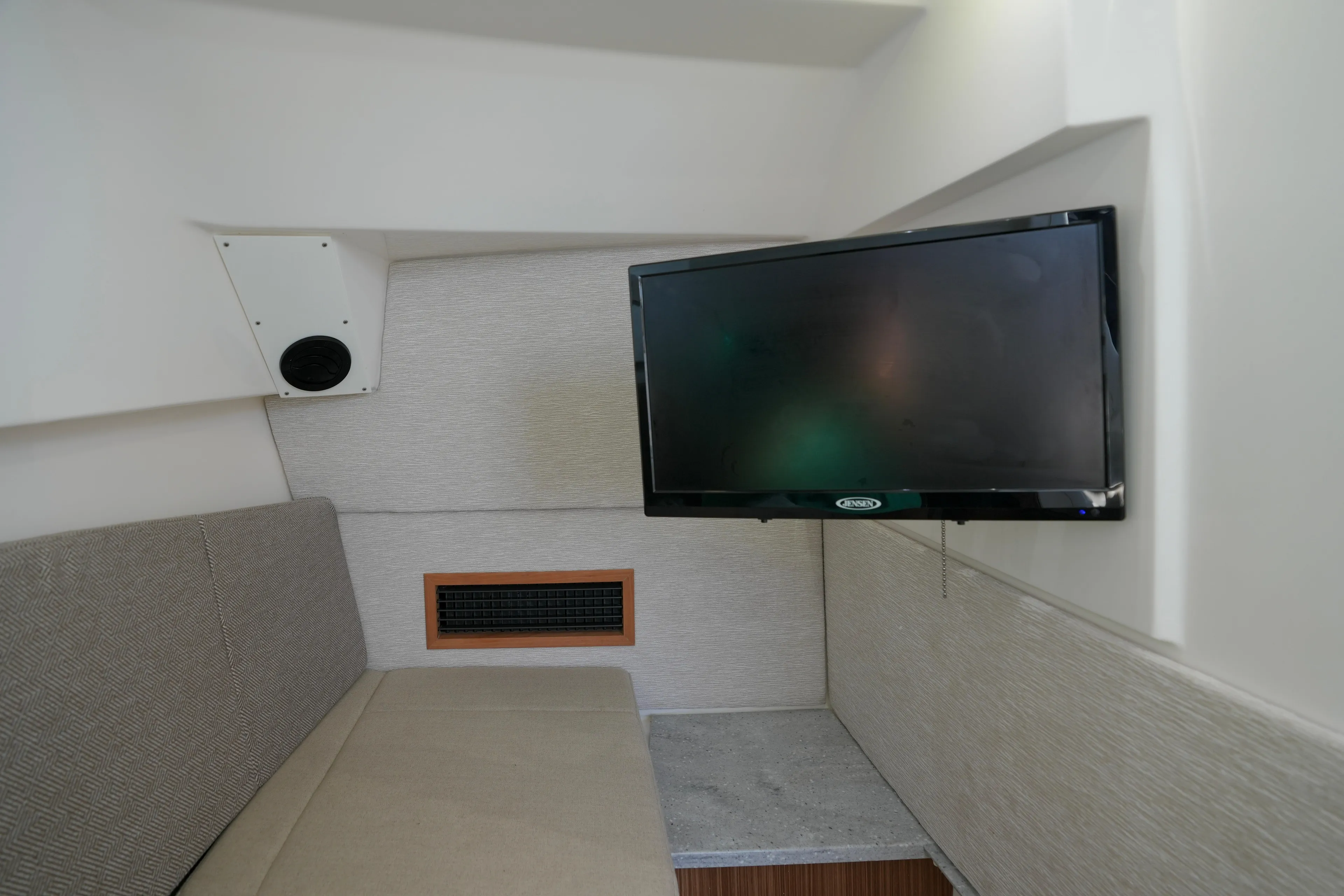  Yacht Photos Pics Interior of 2023 Everglades 340 Dual Console with TV and seating area.