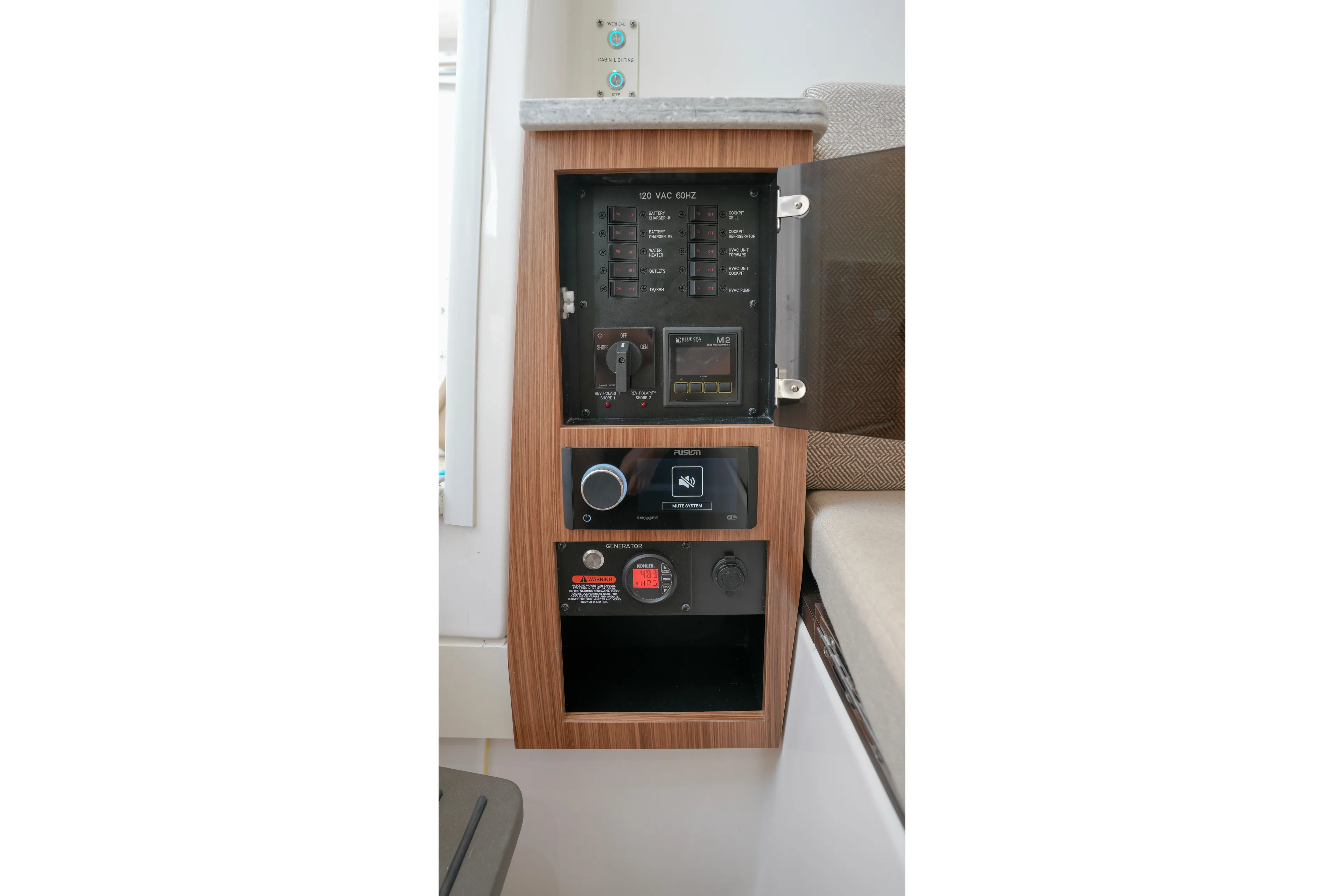  Yacht Photos Pics Control panel of 2023 Everglades 340 Dual Console boat, featuring electrical switches and audio system.