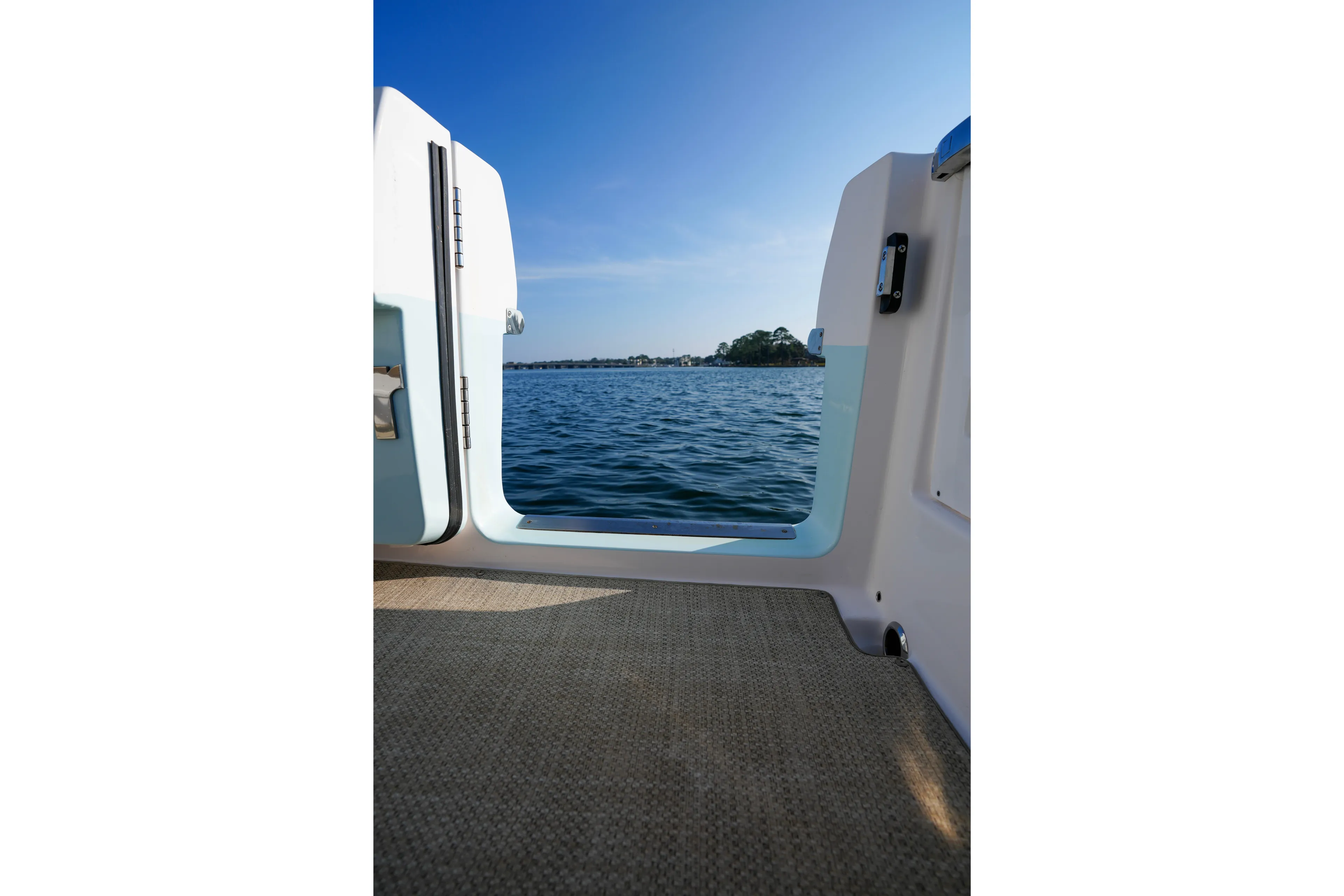  Yacht Photos Pics View from Everglades 340 Dual Console boat, open door to serene water, 2023 model.