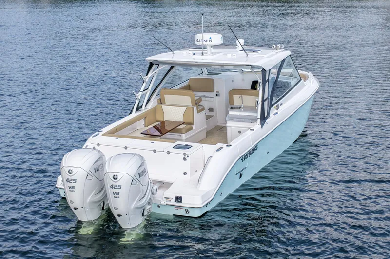  Yacht Photos Pics 2023 Everglades 340 Dual Console boat on water, featuring twin Yamaha 425 engines.