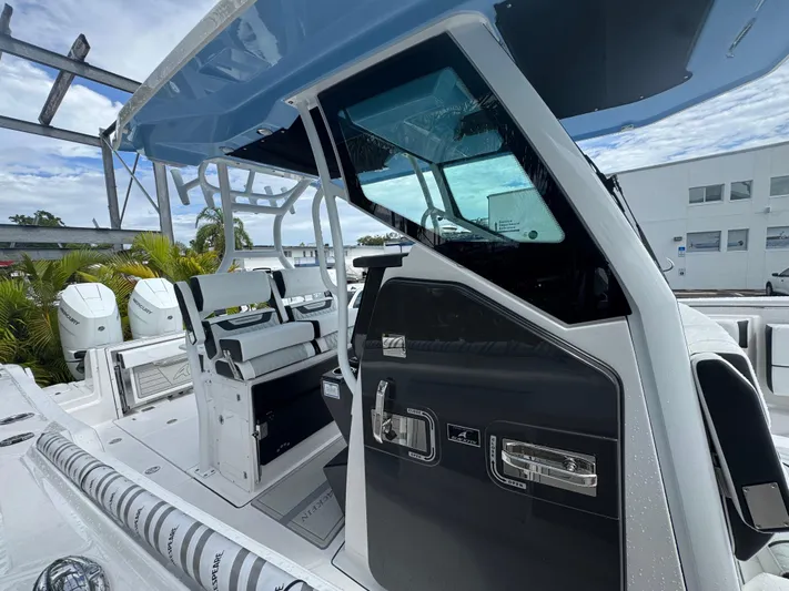  Yacht Photos Pics 2026 Blackfin 302 CC boat with sleek design and modern seating.