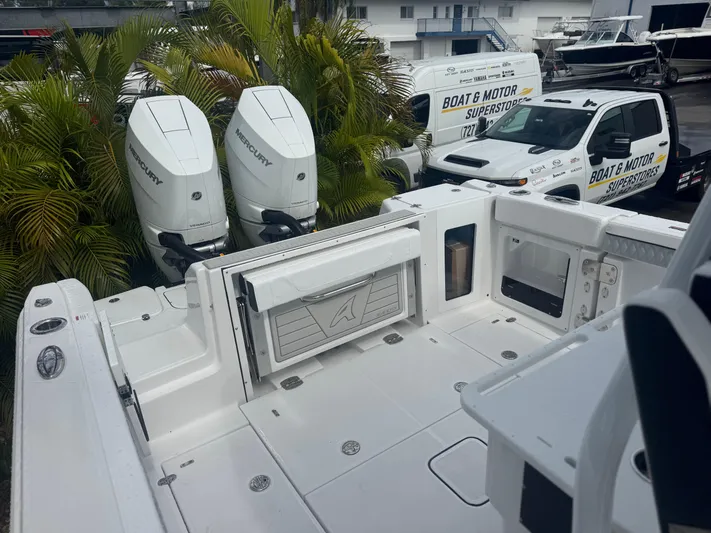  Yacht Photos Pics 2026 Blackfin 302 CC boat with twin Mercury engines at dealership.