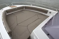 2023 Pacific Craft 750 Open boat with spacious cushioned seating area.