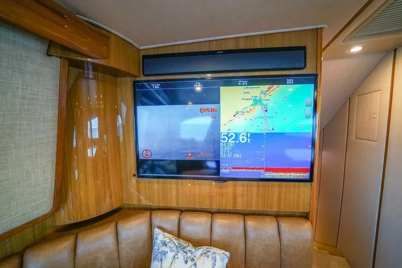 Synchronicity Yacht Photos Pics 2013 Viking 55 Convertible yacht interior with navigation display.