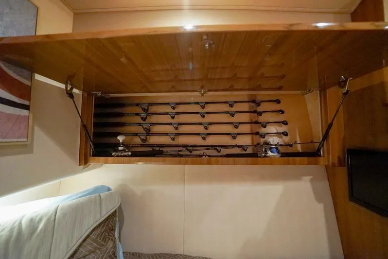 Synchronicity Yacht Photos Pics Fishing rod storage in 2013 Viking 55 Convertible yacht interior.