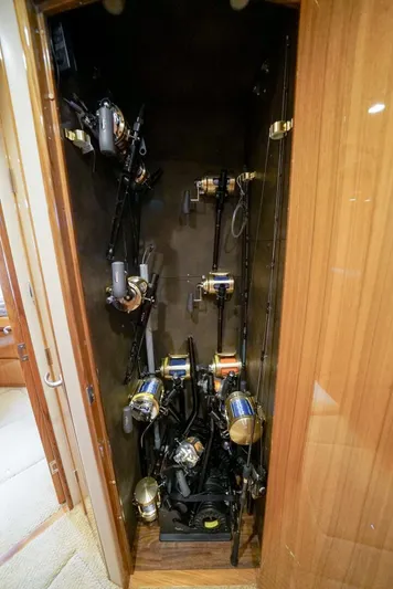 Synchronicity Yacht Photos Pics Fishing rod storage inside 2013 Viking 55 Convertible yacht.