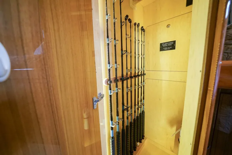 Synchronicity Yacht Photos Pics Fishing rod storage in 2013 Viking 55 Convertible yacht.