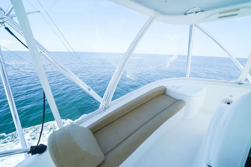 Synchronicity Yacht Photos Pics Viking 55 Convertible 2013 yacht interior with ocean view through large windows.