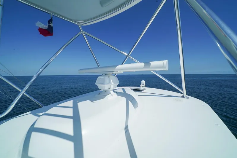 Synchronicity Yacht Photos Pics Viking 55 Convertible 2013 yacht radar on open sea with clear blue sky.