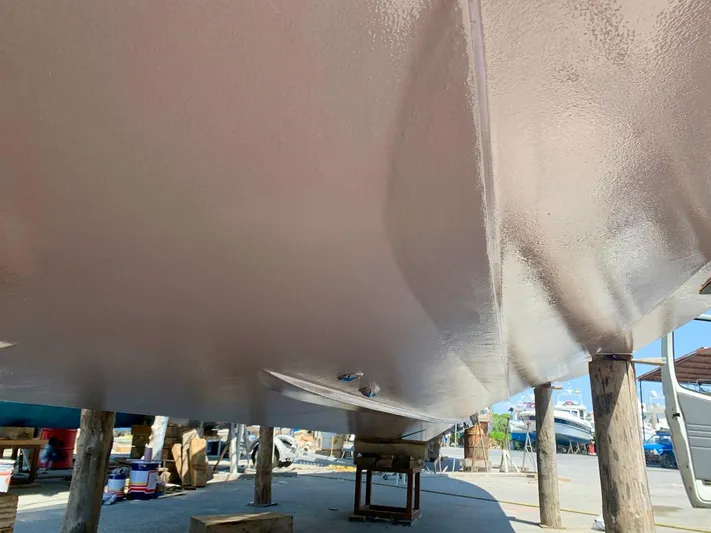  Yacht Photos Pics Underneath view of a 2006 Absolute 45 boat hull in a shipyard.