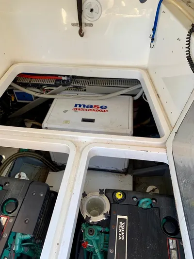  Yacht Photos Pics Engine compartment of a 2006 Absolute 45 boat with Mase generator visible.