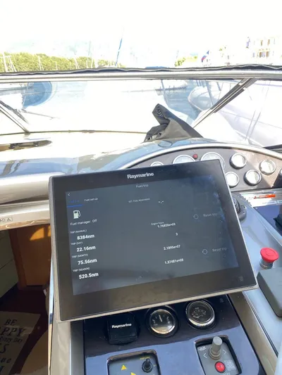  Yacht Photos Pics Control panel of a 2006 Absolute 45 yacht with Raymarine navigation display.
