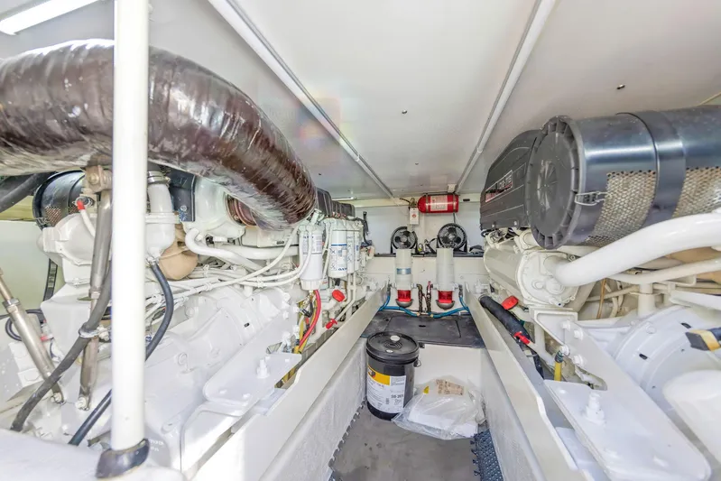 El Matador Yacht Photos Pics Engine room of 2007 Silverton 45 Convertible yacht, showcasing mechanical components and systems.