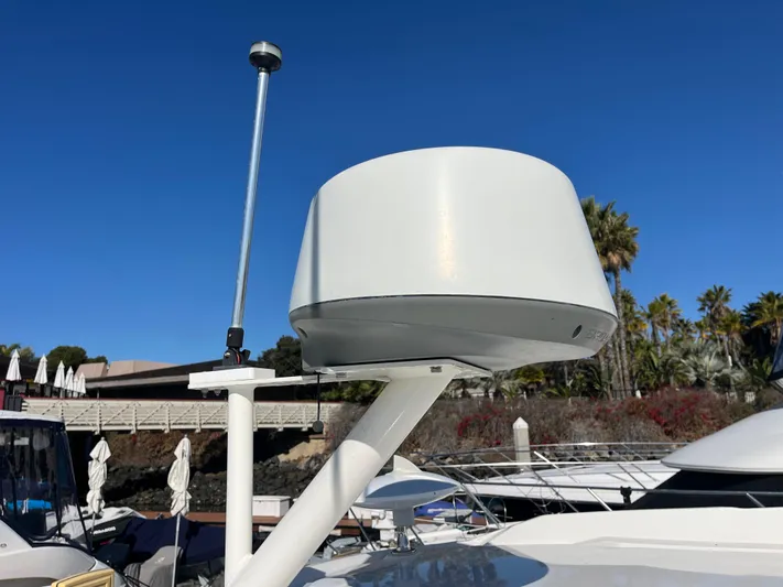  Yacht Photos Pics Radar equipment on 2018 Sea Ray Sundancer 350 yacht under clear blue sky.