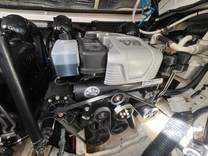  Yacht Photos Pics Engine compartment of a 2018 Sea Ray Sundancer 350 boat, showcasing the V8 engine.