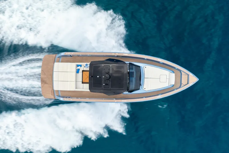 Exit Strategy Yacht Photos Pics Aerial view of 2023 Pardo Yachts 50 cruising on blue ocean waters.