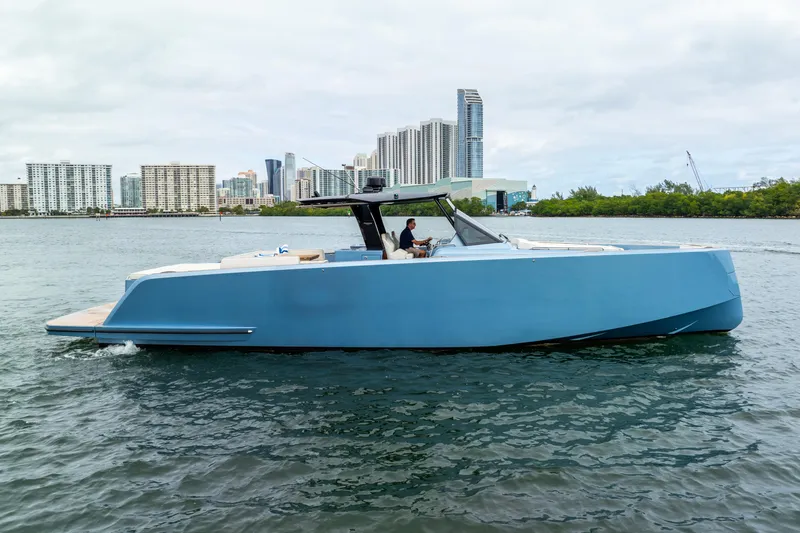 Exit Strategy Yacht Photos Pics 2023 Pardo Yachts 50 cruising near city skyline on calm waters.