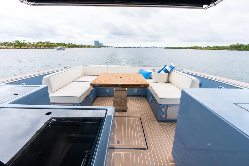 Exit Strategy Yacht Photos Pics Luxurious 2023 Pardo Yachts 50 with elegant seating and scenic water view.