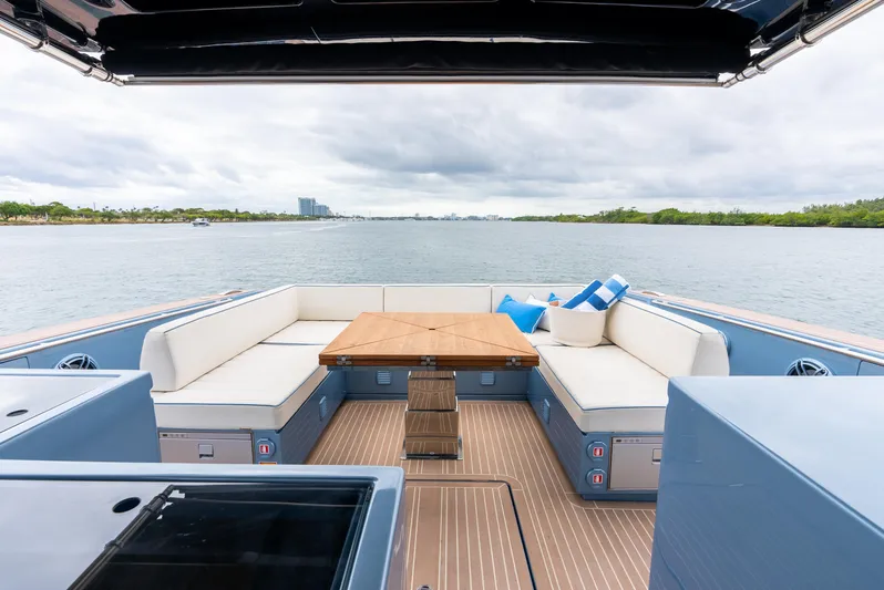 Exit Strategy Yacht Photos Pics Luxurious 2023 Pardo Yachts 50 with elegant seating and scenic water view.