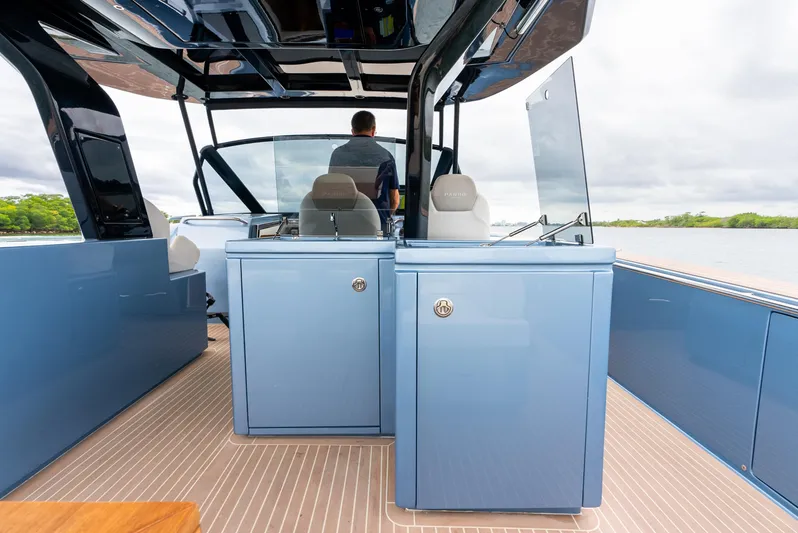 Exit Strategy Yacht Photos Pics 2023 Pardo Yachts 50 interior with sleek blue cabinetry and modern design.