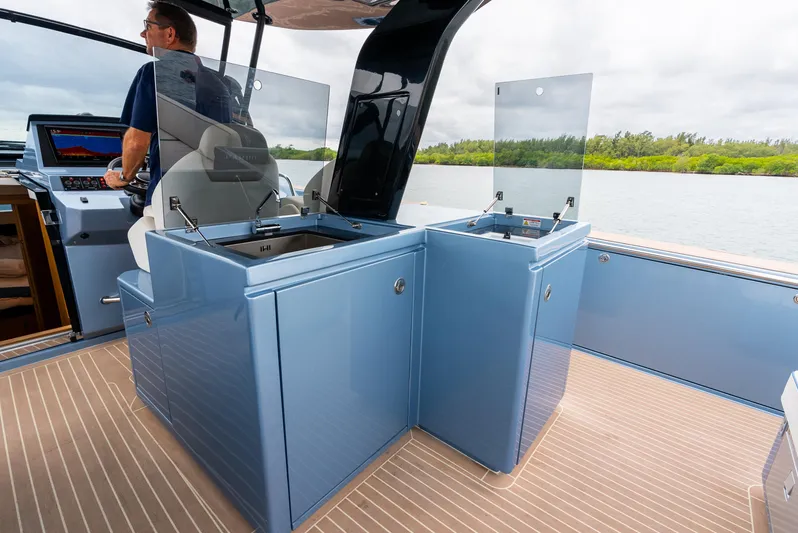 Exit Strategy Yacht Photos Pics Modern Pardo Yachts 50 cockpit with sleek blue cabinetry, 2023 model.