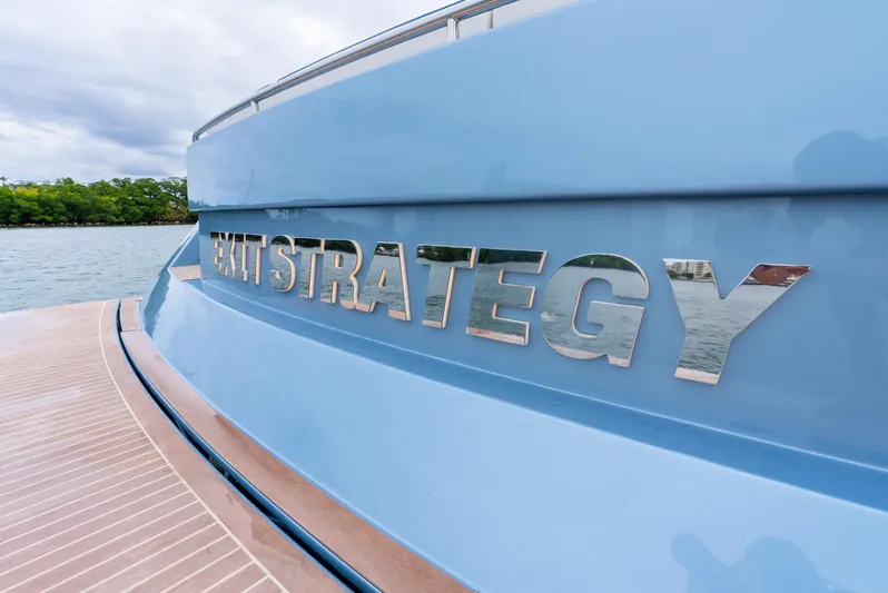 Exit Strategy Yacht Photos Pics 2023 Pardo Yachts 50 with "Exit Strategy" nameplate on blue hull.