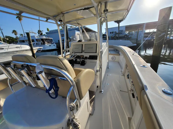Every Effort Yacht Photos Pics 2008 Jupiter 34 FS boat interior at marina with helm and seating.