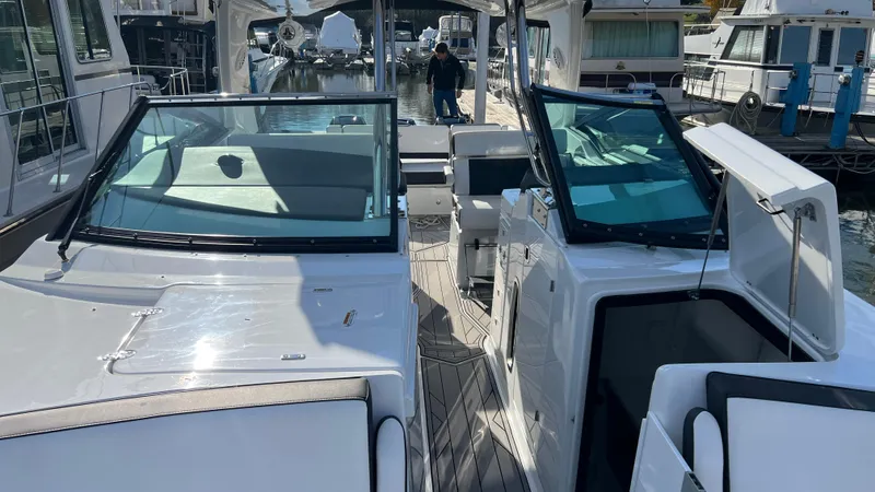  Yacht Photos Pics 2021 Monterey 385 SE yacht interior with sleek design and spacious seating.