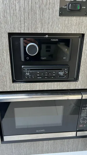  Yacht Photos Pics Monterey 385 SE 2021 interior with Fusion stereo and Muave microwave.