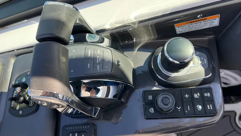  Yacht Photos Pics 2021 Monterey 385 SE boat control panel with throttle and joystick.