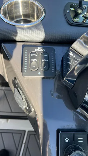  Yacht Photos Pics Control panel of 2021 Monterey 385 SE boat with Lenco trim tab switches.