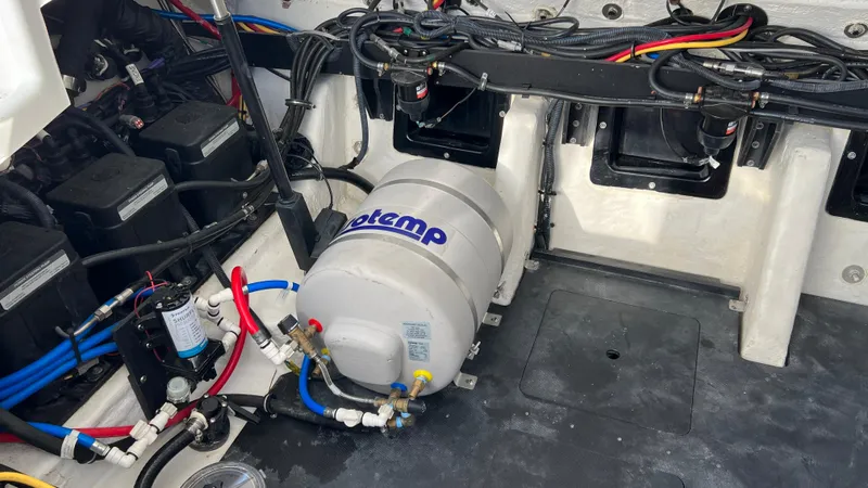  Yacht Photos Pics Engine compartment of 2021 Monterey 385 SE boat with wiring and equipment.