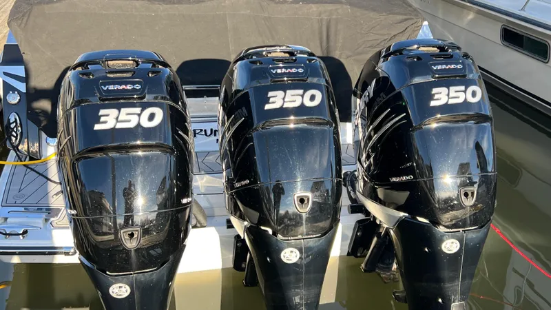  Yacht Photos Pics Three black Verado 350 outboard engines on a 2021 Monterey 385 SE boat.