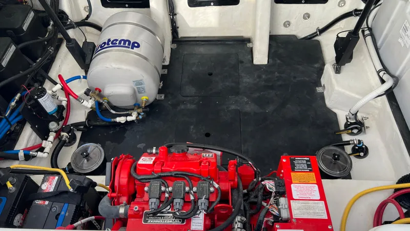  Yacht Photos Pics Engine compartment of a 2021 Monterey 385 SE boat with mechanical components.