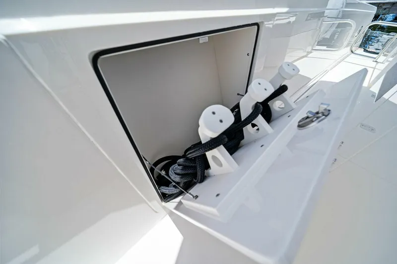  Yacht Photos Pics 2023 Tiara Yachts 38 LS storage compartment with neatly organized ropes.