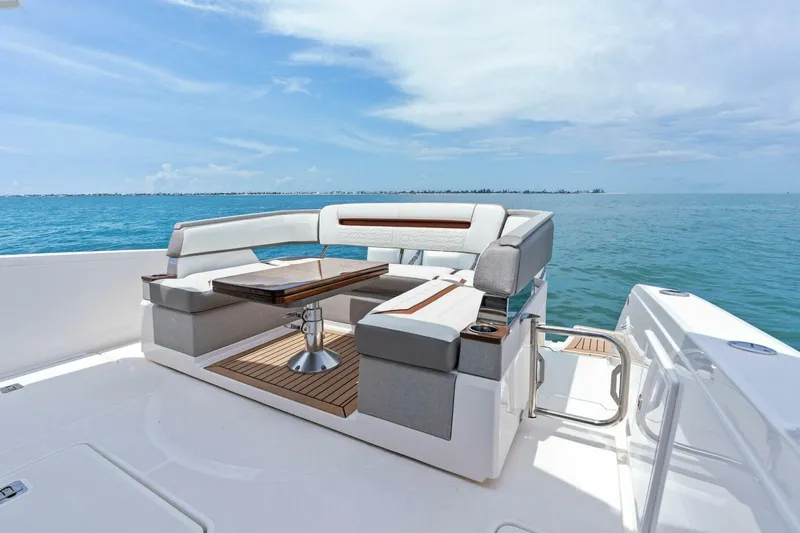  Yacht Photos Pics 2023 Tiara Yachts 38 LS luxury seating area with ocean view.